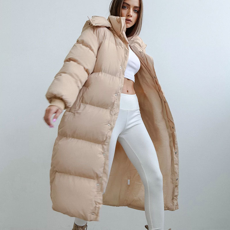 Długa damska zimowa kurtka z kapturem – ciepła, wiatroszczelna i modna