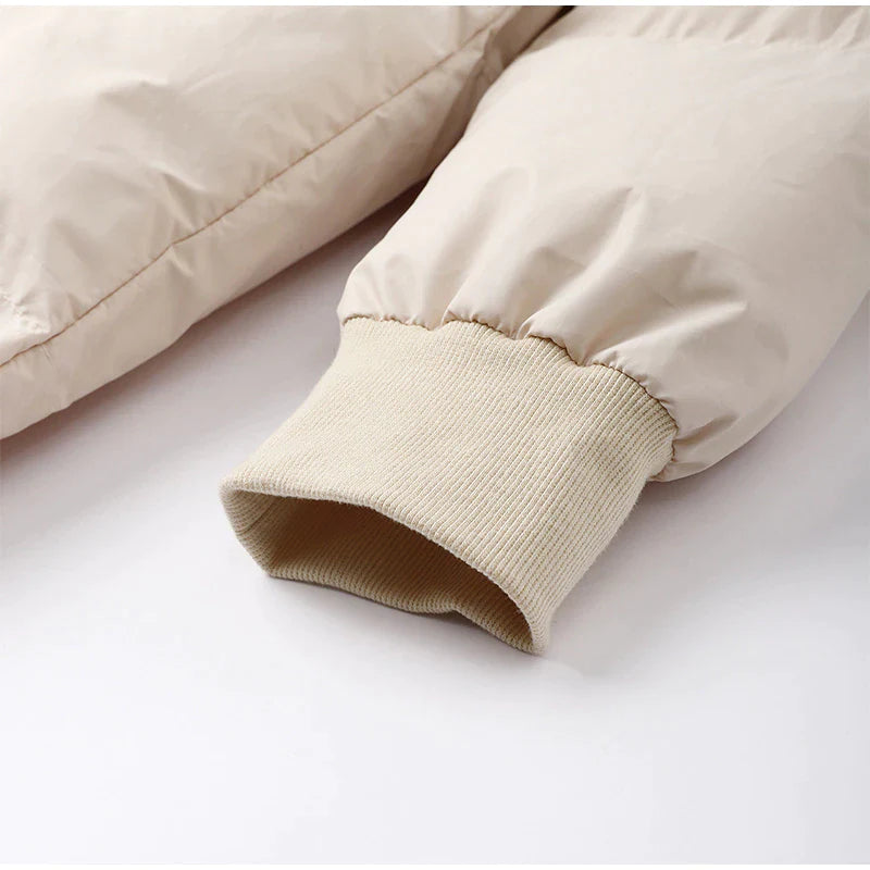 Długa damska zimowa kurtka z kapturem – ciepła, wiatroszczelna i modna