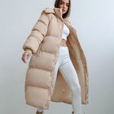 Długa damska zimowa kurtka z kapturem – ciepła, wiatroszczelna i modna