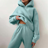 Oversized damski dres z kapturem i szerokimi spodniami dresowymi