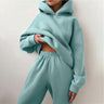 Oversized damski dres z kapturem i szerokimi spodniami dresowymi
