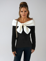 Sweter w serek z elegancką kokardą
