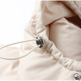 Długa damska zimowa kurtka z kapturem – ciepła, wiatroszczelna i modna