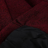 Damski płaszcz z kapturem – długi fason z dekoracyjnymi wstawkami