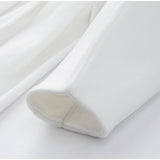 Elegancki długi płaszcz damski – stylowy płaszcz z rozcięciem i paskiem