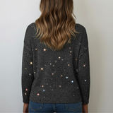 Damski sweter z dekoltem w serek i cekinami – elegancki i modny