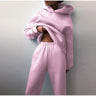 Oversized damski dres z kapturem i szerokimi spodniami dresowymi
