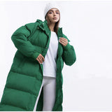 Długa damska zimowa kurtka z kapturem – ciepła, wiatroszczelna i modna